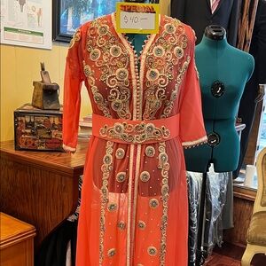 Elegant Coral Dress with Gold Embellishments